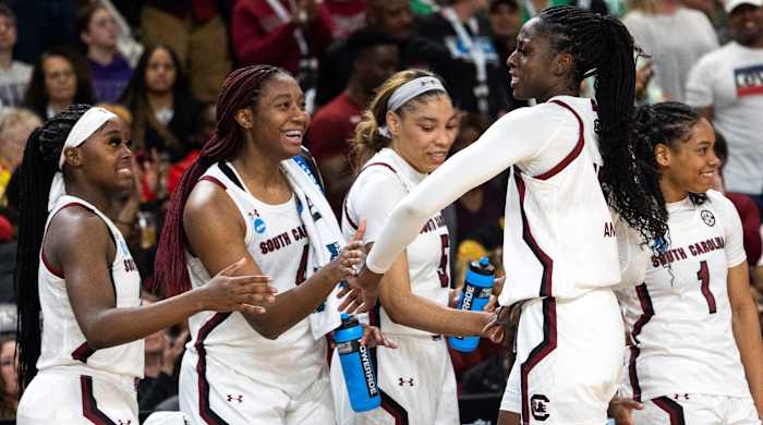 South Carolina’s Laeticia Amihere celebrates with her teammates in the closing moments against UCLA in the Sweet 16 of the NCAA women’s tournament.